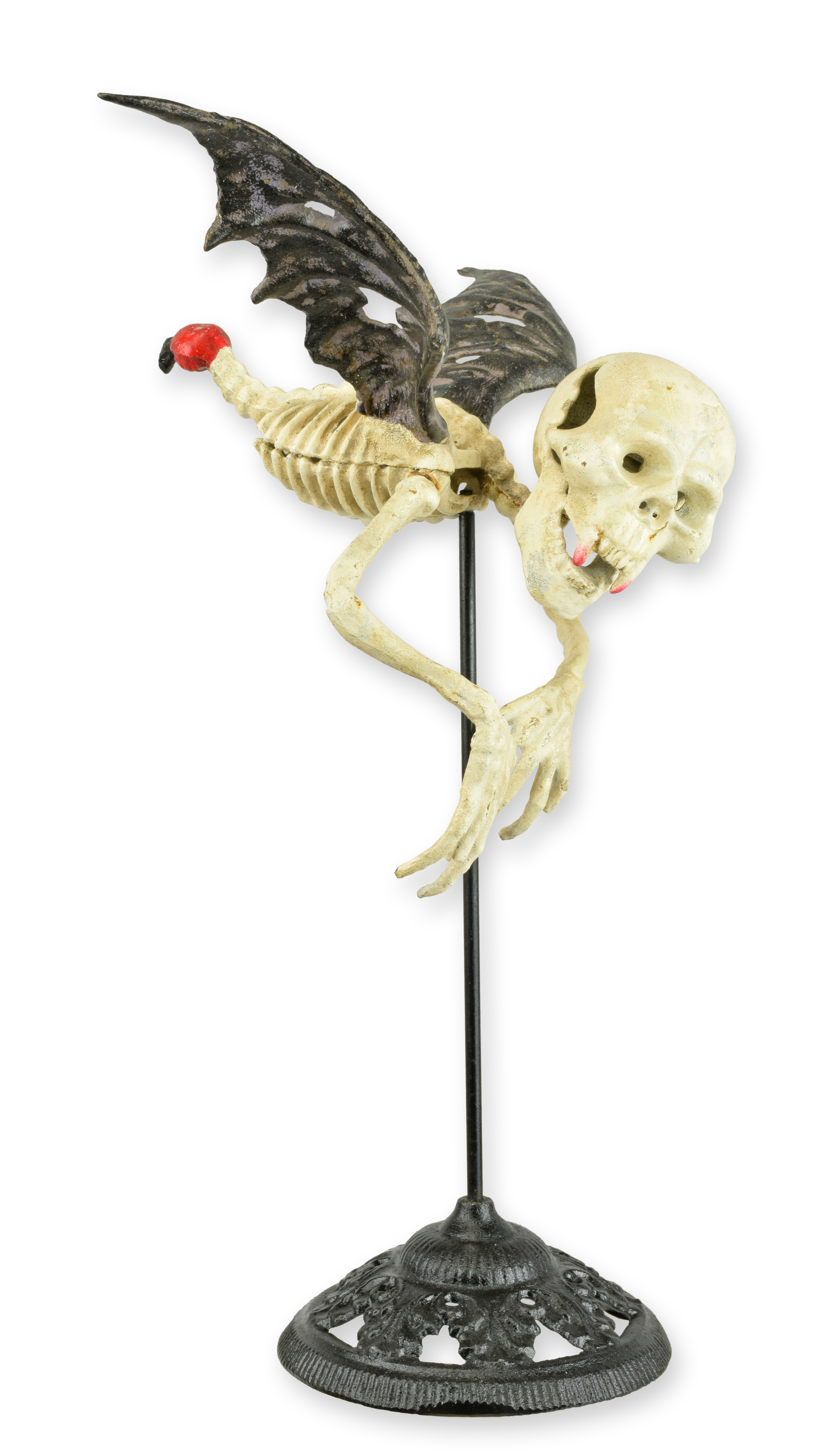 Un vampiro esqueleto volador de hierro fundido sobre un soporte. réplica diseño retro decoración